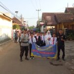 Bhabinkamtibmas Polsek Cisaat laksnakan pengamanan Pawai Karnaval