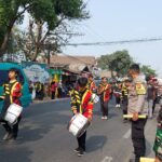 Semarak Kemerdekaan Polsek Cisaat laksanakan Pengamanan Pawai Karnaval